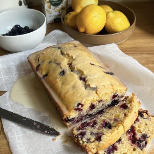 blueberry and lemon loaf cake cut into slices