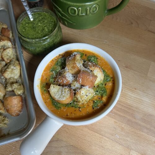 heirloom tomato and butternut squash soup from above in a white bowl